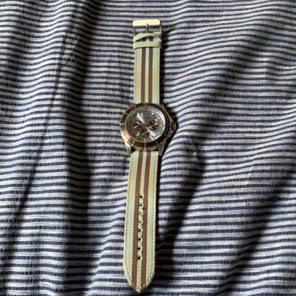 This is a baby blue Guess Watch.